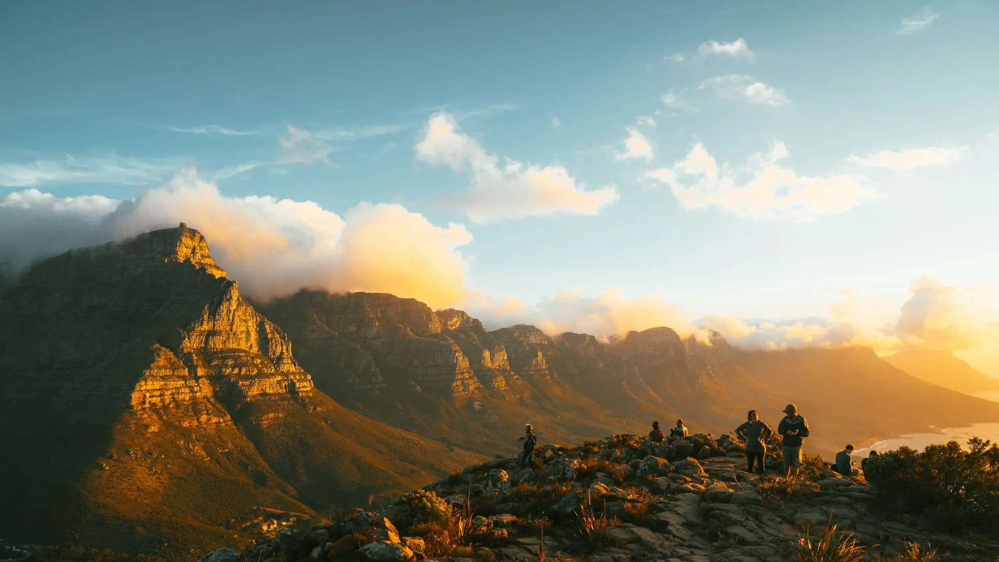 Golden evening light on Table Mountain and the Twelve Apostles above Cape Town